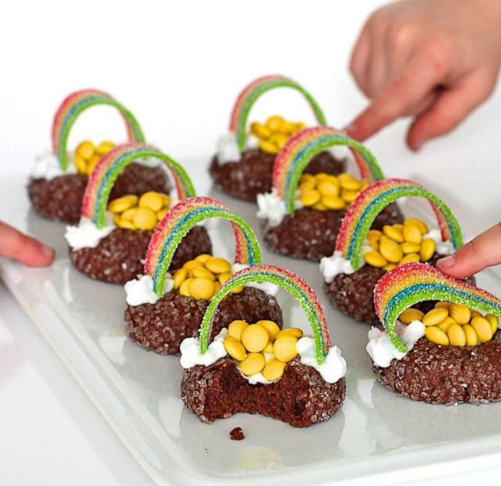 PHOTO: Chocolate "pot of gold" cookies with a rainbow candy strip.