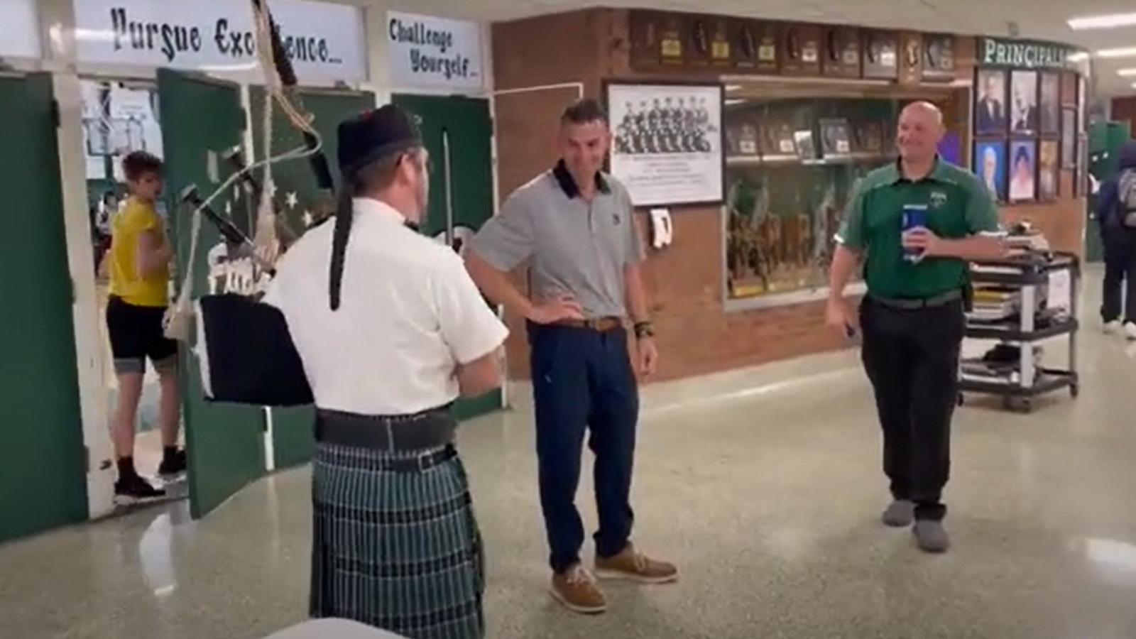 PHOTO: Students at Richwoods High School hired a bagpiper to follow Richwoods Principal Billy Robison for a day as their senior prank.