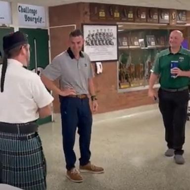 PHOTO: Students at Richwoods High School hired a bagpiper to follow Richwoods Principal Billy Robison for a day as their senior prank.