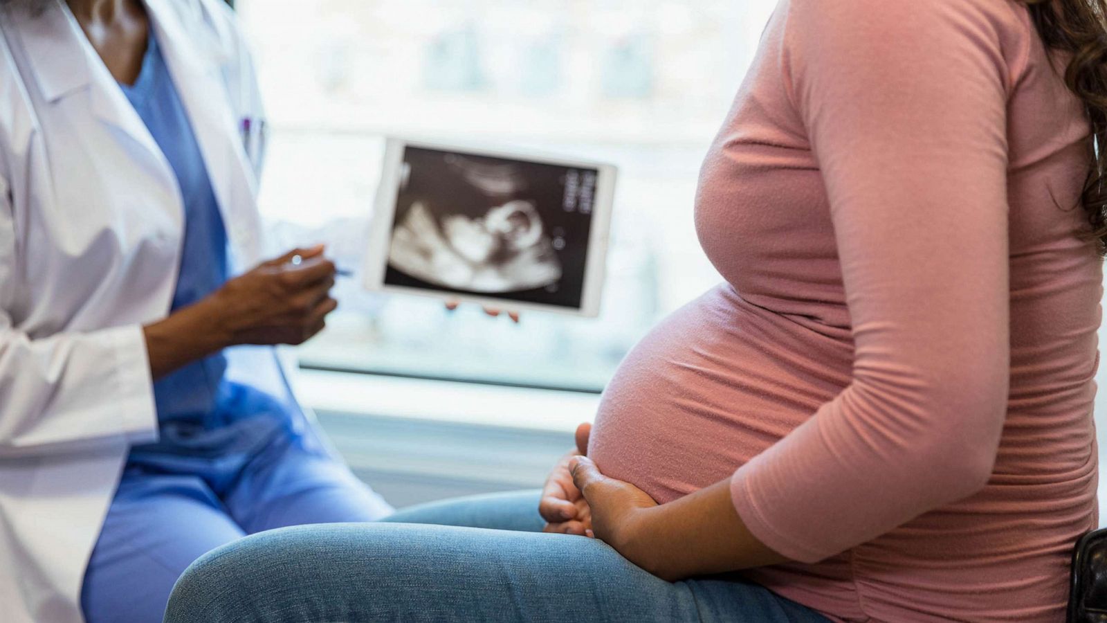 PHOTO: A photo of a pregnant woman in a doctors office pictured.