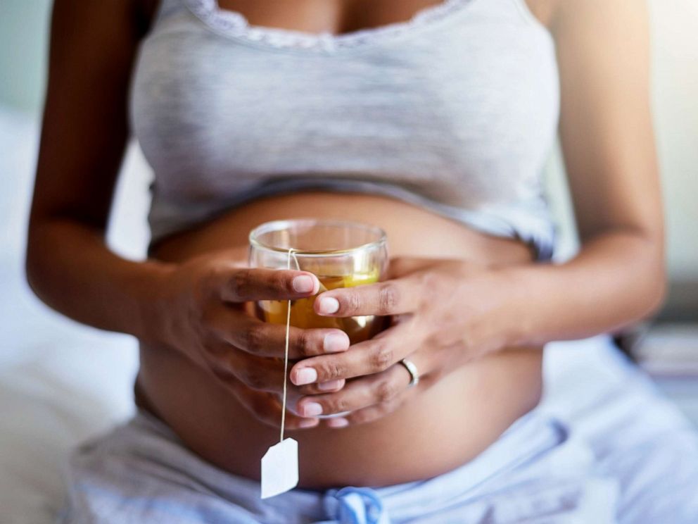 PHOTO: A pregnant woman sips tea in this stock photo.