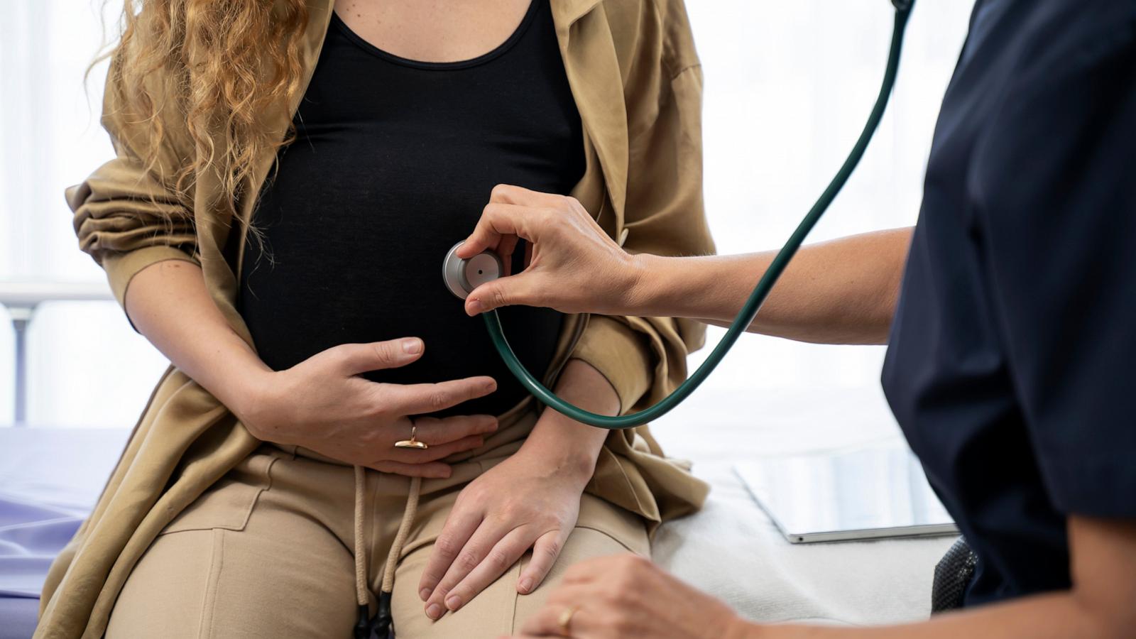 PHOTO: Stock photo of a pregnant woman visiting a doctor.