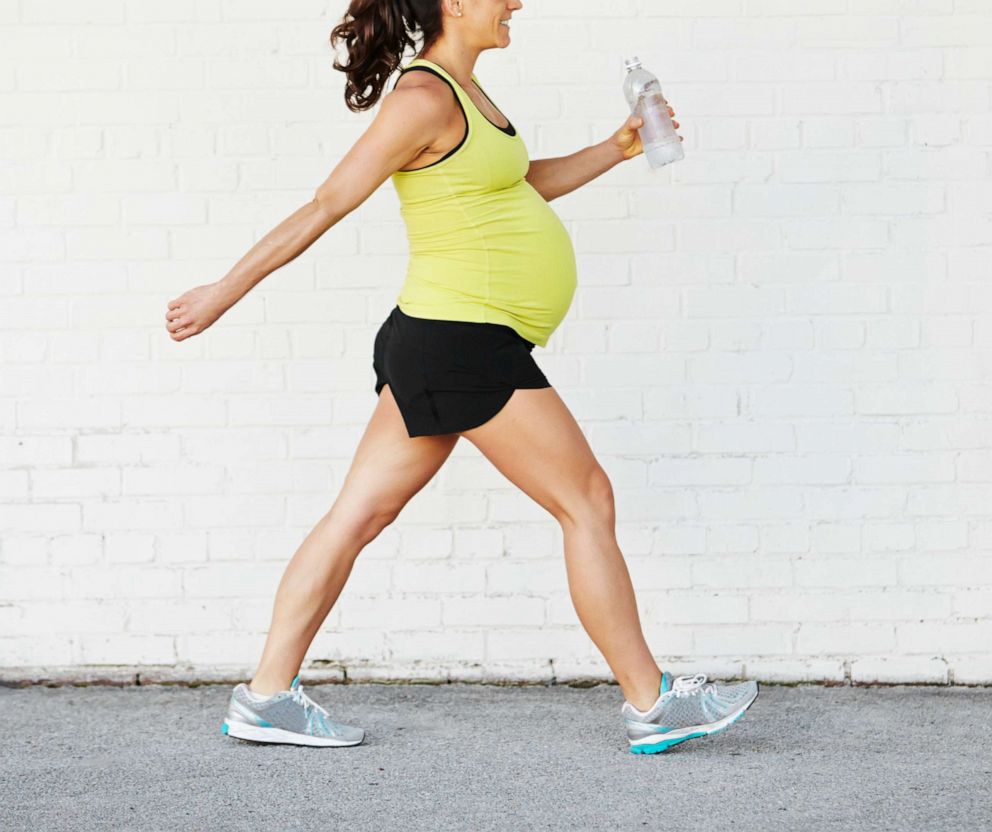 PHOTO: A pregnant woman exercises in this undated stock photo.