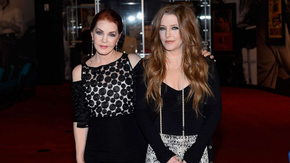 PHOTO: Priscilla Presley and Lisa Marie Presley attend the ribbon-cutting ceremony during the grand opening of "Graceland Presents ELVIS: The Exhibition - The Show - The Experience" at the Westgate Las Vegas Resort & Casino, April 23, 2015, in Las Vegas.