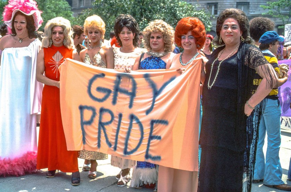 PHOTO: View of female impersonators at gay pride rally, Copley Square, Boston, 1977. 