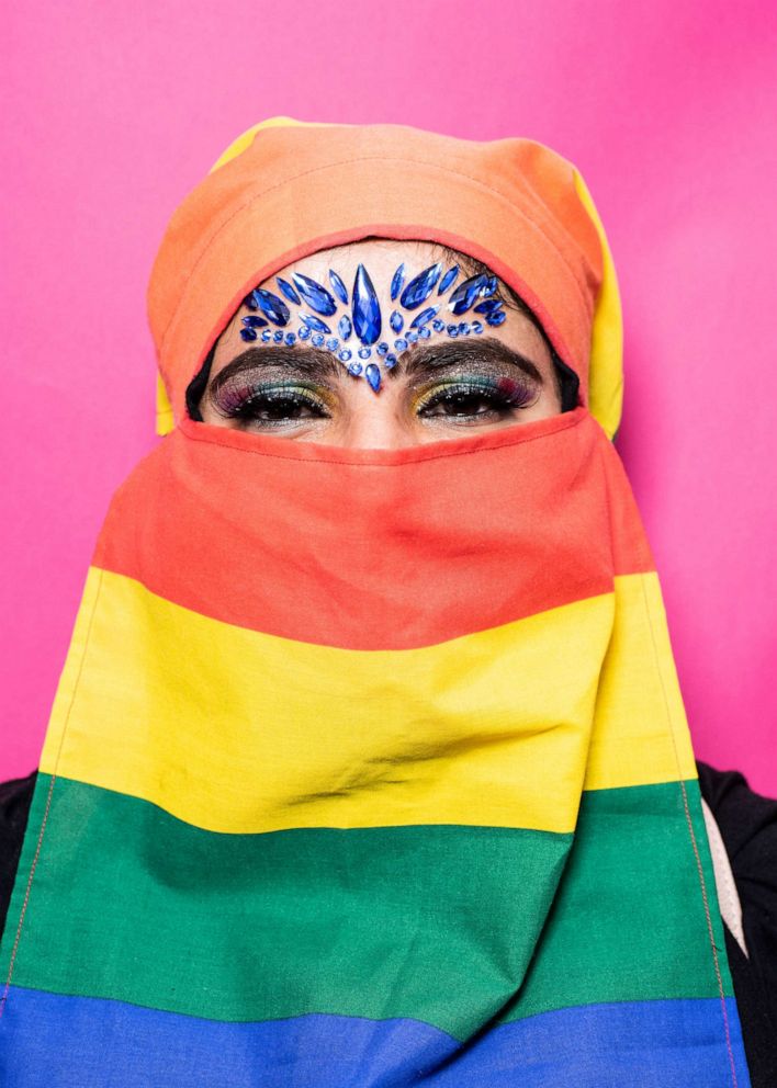 PHOTO: A parade goer wearing a rainbow Niqab poses during Pride, July 6, 2019, in London.