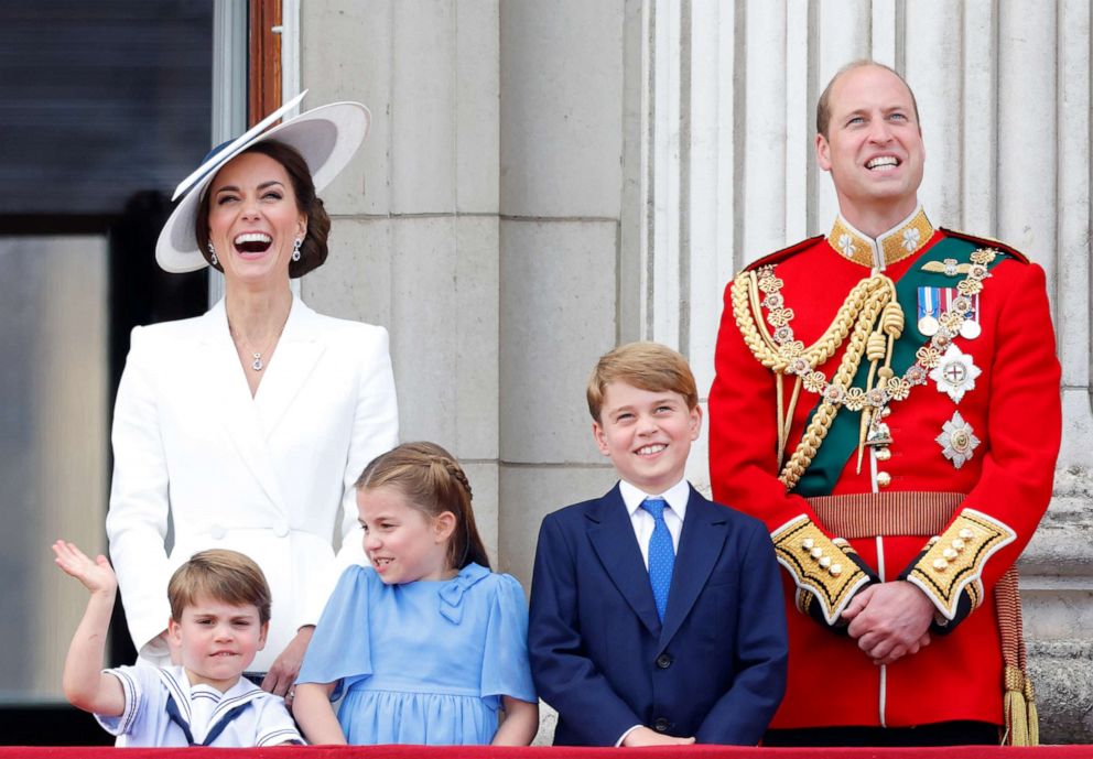 PHOTO: Prince Louis, Catherine, Duchess of Cambridge, Princess Charlotte, Prince George and Prince William watch a flypast from the balcony of Buckingham Palace during Trooping the Colour, June 2, 2022, in London.