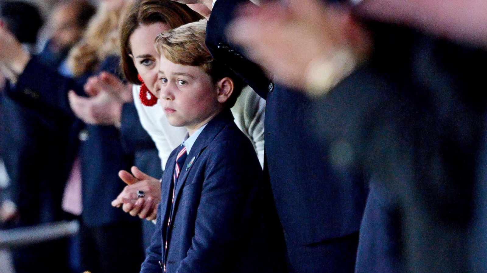 PHOTO: Britain's Prince William, Catherine, Duchess of Cambridge and Prince George attend the Euro 2020 Championship Final football game between Italy and England at Wembley Stadium on July 11, 2021 in London.
