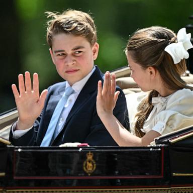 PHOTO: Prince George of Wales and Princess Charlotte of Wales make their way back to Buckingham Palace from Horse Guards Parade during the King's Birthday Parade "Trooping the Colour" in London on June 13, 2026.