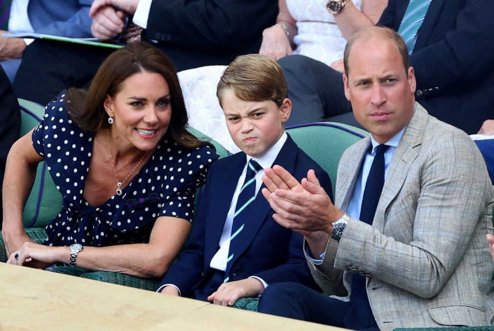 PHOTO: The Duke and Duchess of Cambridge talk to their son Prince George as they attend the men's singles final tennis match between Serbia's Novak Djokovic and Australia's Nick Kyrgios at the 2022 Wimbledon Championships in London, July 10, 2022.