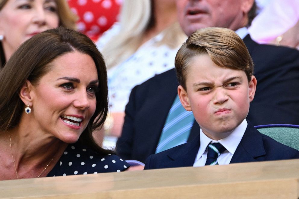 PHOTO:  Catherine, Duchess of Cambridge talks to her son Prince George as they attend the men's singles final tennis match between Serbia's Novak Djokovic and Australia's Nick Kyrgios at the 2022 Wimbledon Championships in London, July 10, 2022.