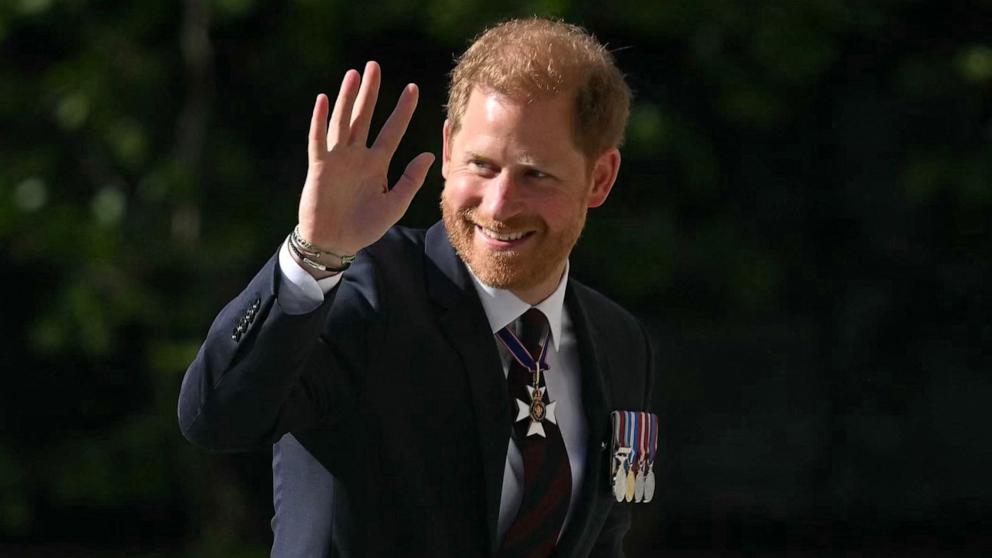 PHOTO: Britain's Prince Harry, Duke of Sussex waves as he arrives to attend a ceremony marking the 10th anniversary of the Invictus Games, at St. Paul's Cathedral, May 8, 2024, in London.