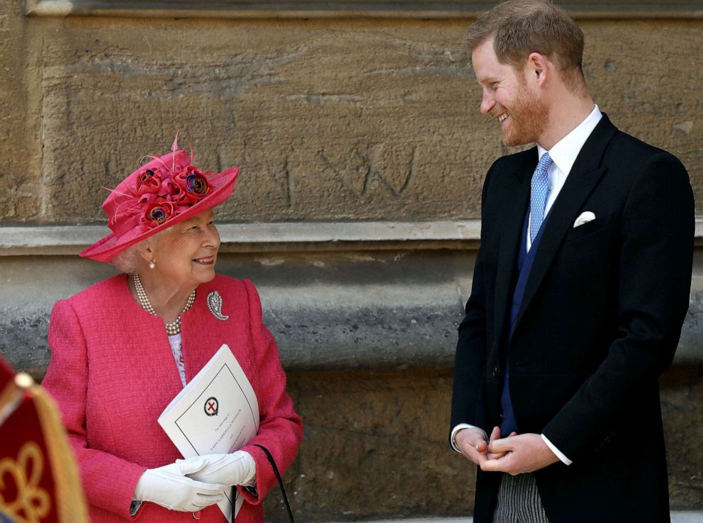 PHOTO: Queen Elizabeth II and Britain's Prince Harry, Duke of Sussex, leave St George's Chapel in Windsor Castle, Windsor, England, May 18, 2019.