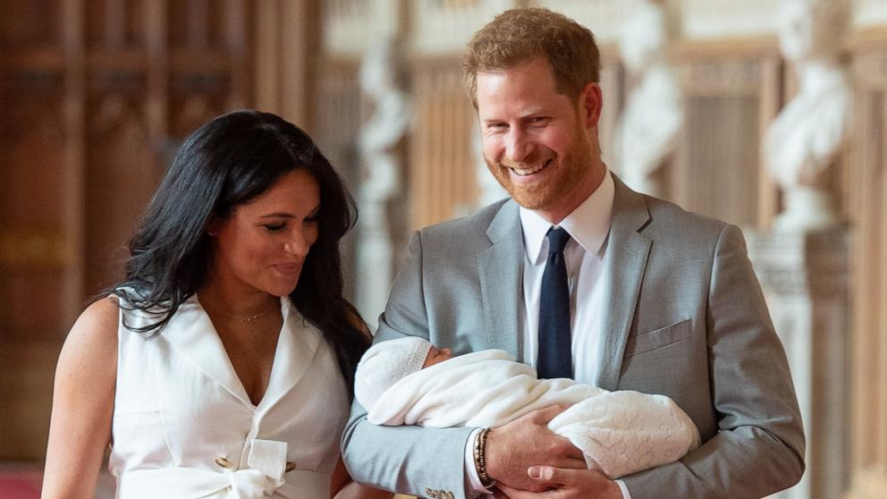 PHOTO: Prince Harry, Duke of Sussex and Meghan, Duchess of Sussex, pose with their newborn son Archie Harrison Mountbatten-Windsor during a photocall in St George's Hall at Windsor Castle, May 8, 2019 in Windsor, England. 
