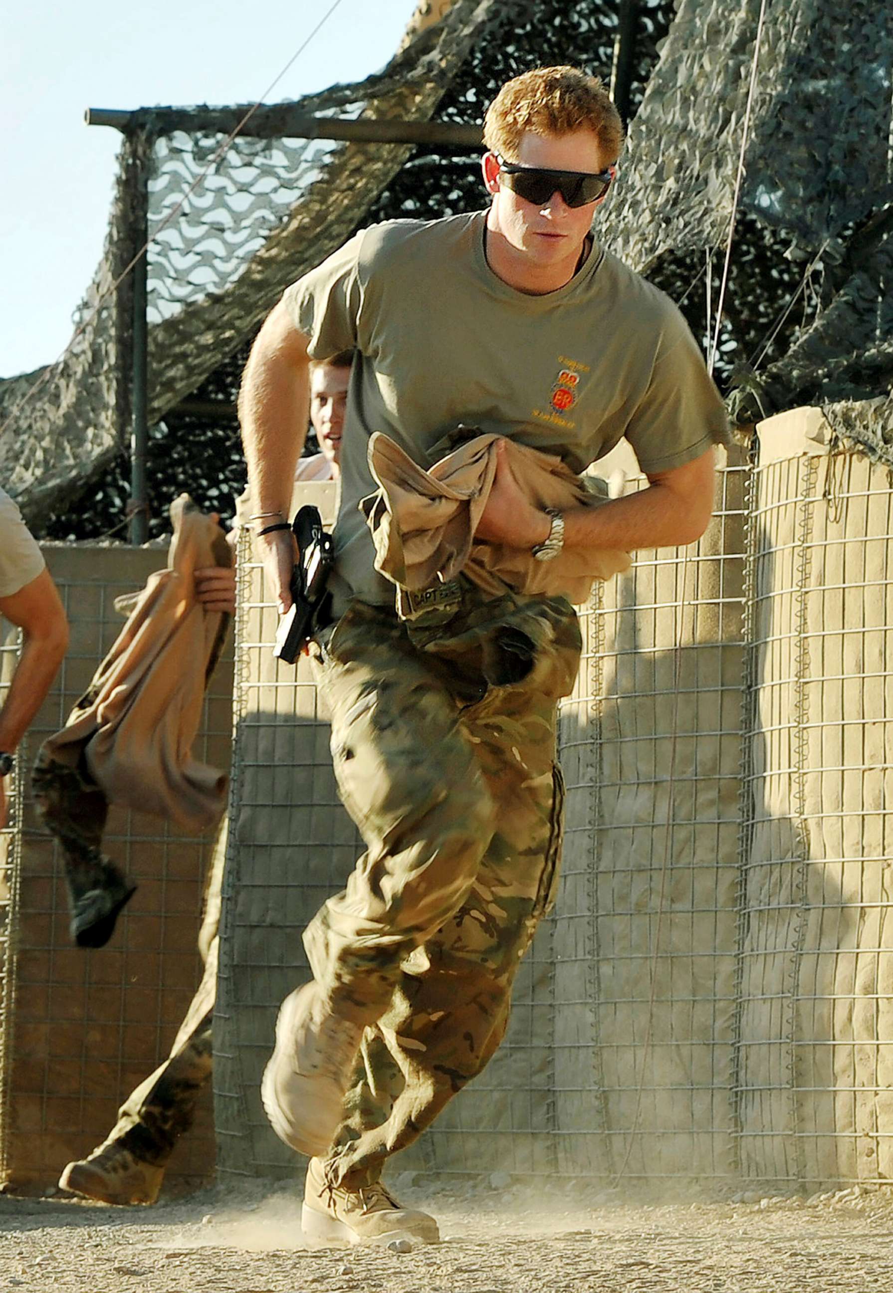 PHOTO: FILE - Britain's Prince Harry races out from the VHR (very high ready-ness) tent to scramble his Apache with fellow Pilots, during his 12 hour shift at the British controlled flight-line in Camp Bastion southern Afghanistan, Nov. 3, 2012.