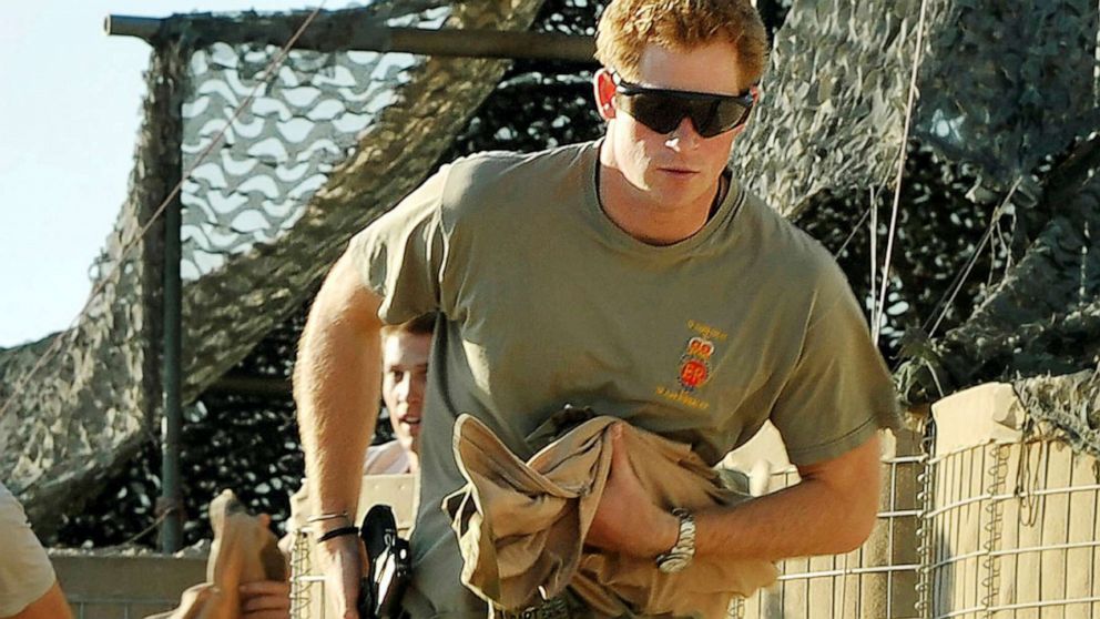 PHOTO: FILE - Britain's Prince Harry races out from the VHR (very high ready-ness) tent to scramble his Apache with fellow Pilots, during his 12 hour shift at the British controlled flight-line in Camp Bastion southern Afghanistan, Nov. 3, 2012.