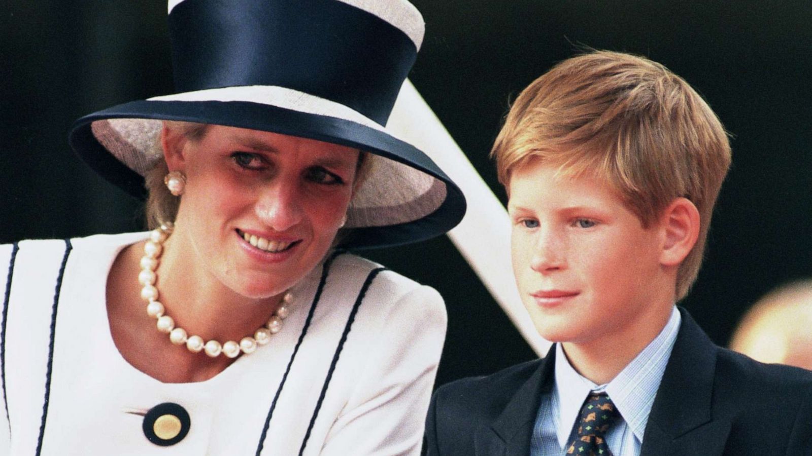 PHOTO: Diana, Princess Of Wales sits with Prince Harry while attending the 50th anniversary celebrations for VJ Day in London, Aug, 19, 1995.