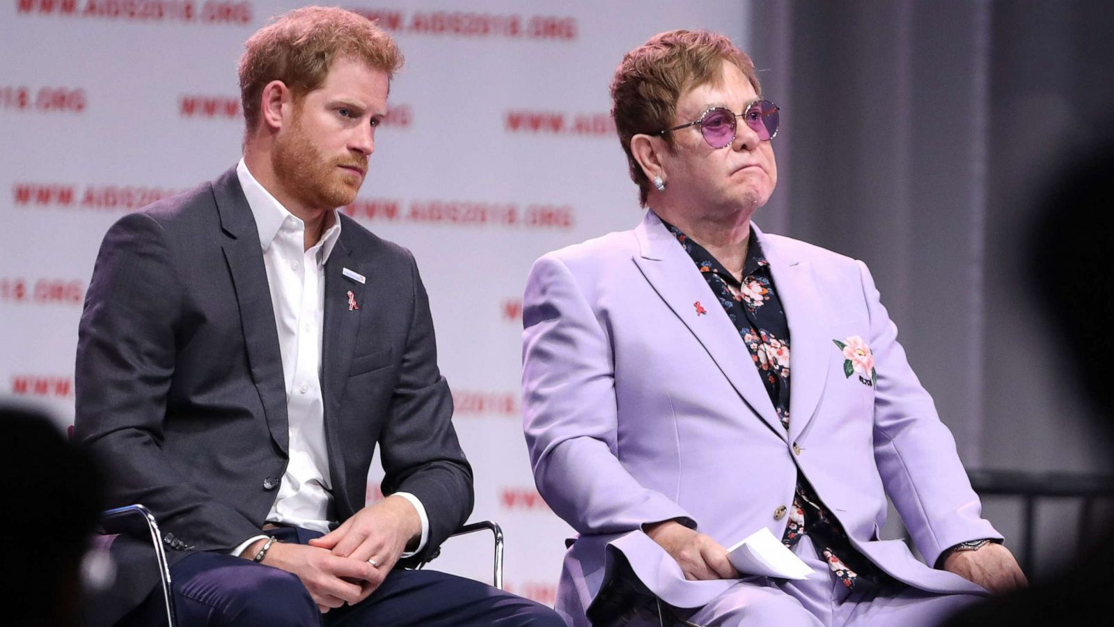 PHOTO: Prince Harry, Duke of Sussex, sits with Sir Elton John during the Aids 2018 summit, in Amsterdam, the Netherlands.