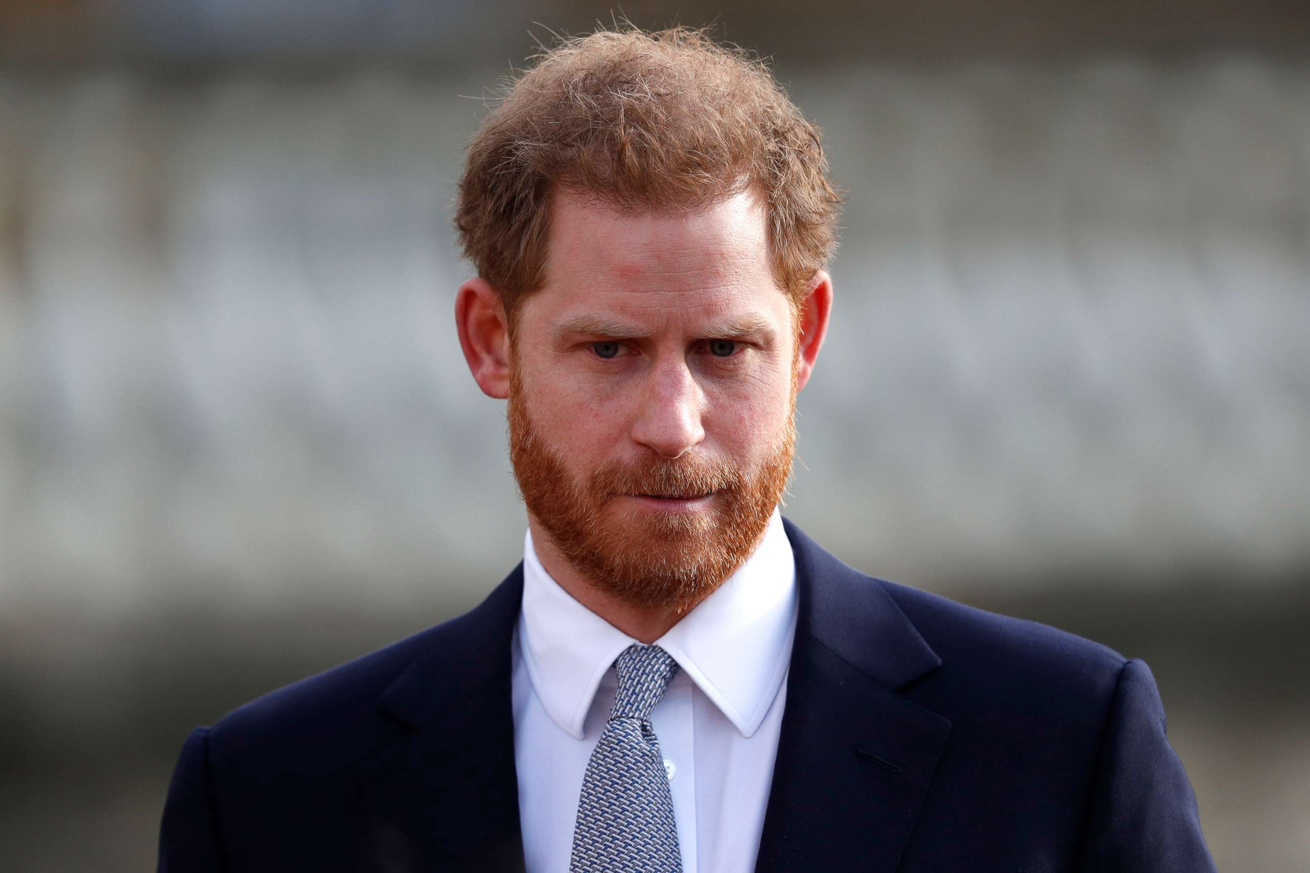 PHOTO: In this file photo taken on January 16, 2020, Britain's Prince Harry, Duke of Sussex watches children play rugby league prior to the draw for the Rugby League World Cup 2021 at Buckingham Palace in London. 