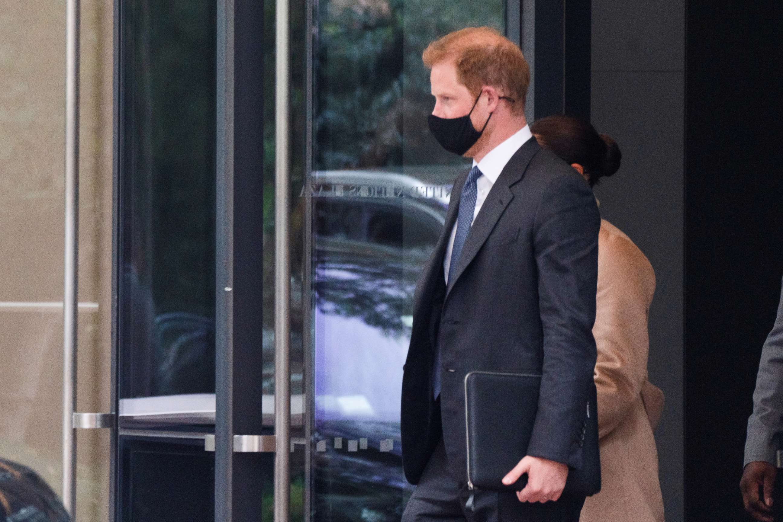 PHOTO: Britain's Prince Harry and Meghan, Duke and Duchess of Sussex, exit the royal residence in New York City, Sept. 23, 2021.