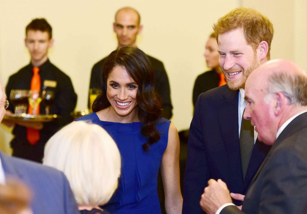 PHOTO: Britain's Prince Harry, Duke of Sussex, and his wife Meghan, Duchess of Sussex chat with guests during the 100 Days to Peace gala in London, Sept. 6, 2018.