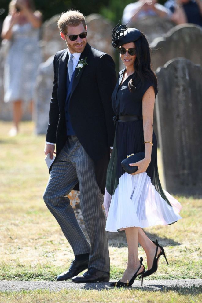 PHOTO: Prince Harry and Duchess Meghan Markle leave the wedding of Charlie Van Straubenzee and Daisy Jenks in Frensham ,U.K., Aug. 4, 2018.