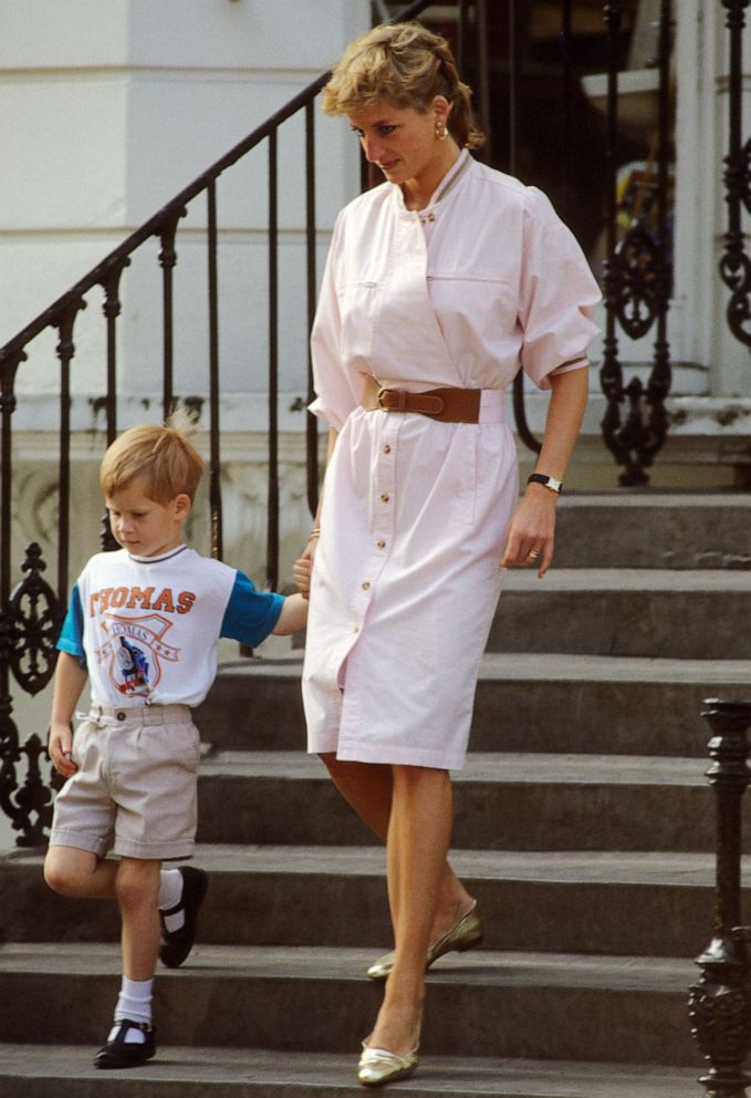 PHOTO: Prince Harry wears a Thomas the Tank Engine tee-shirt when he leaves nursery school with his mother, Diana, Princess of Wales circa June 1989 in London.
