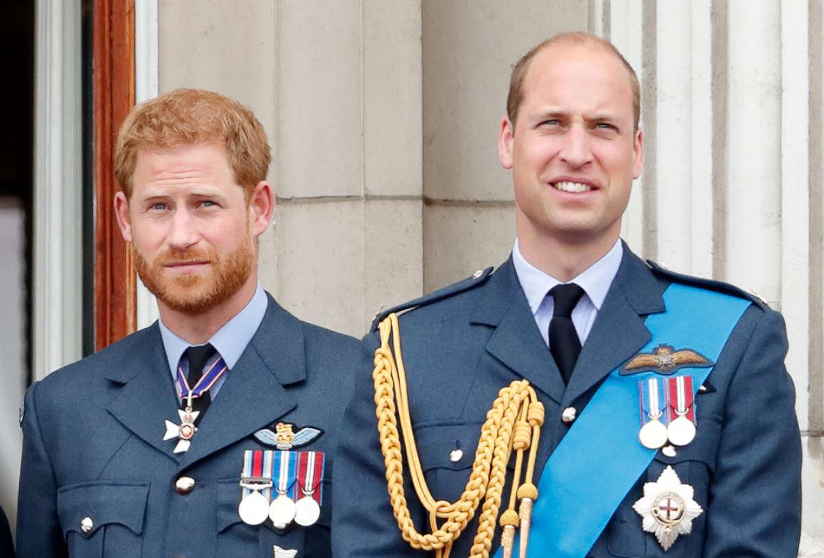 PHOTO: Prince Harry, Duke of Sussex and Prince William, Duke of Cambridge watch a flypast to mark the centenary of the Royal Air Force from the balcony of Buckingham Palace, July 10, 2018, in London.