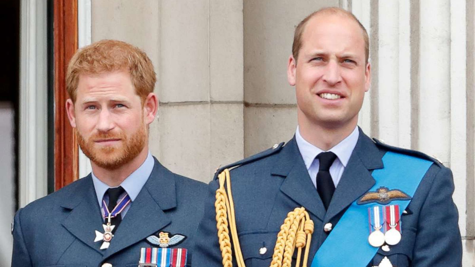 PHOTO: Prince Harry, Duke of Sussex and Prince William, Duke of Cambridge watch a flypast to mark the centenary of the Royal Air Force from the balcony of Buckingham Palace, July 10, 2018, in London.