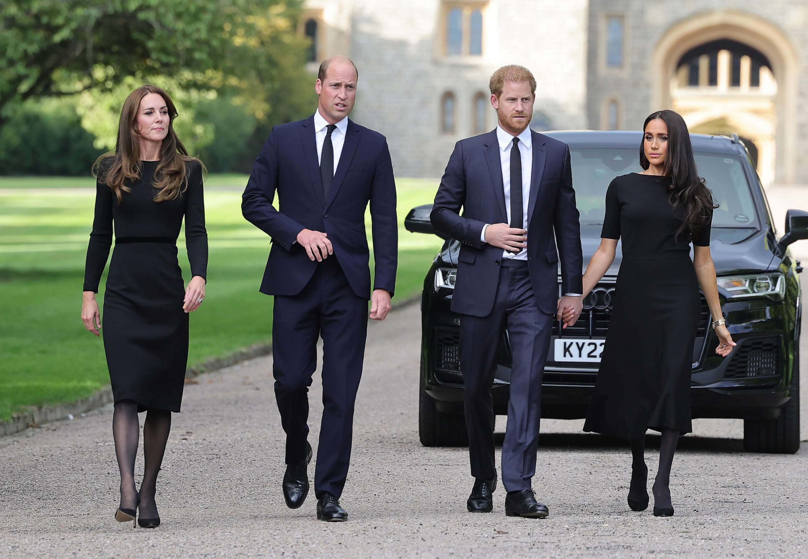 PHOTO: Catherine, Princess of Wales, Prince William, Prince of Wales, Prince Harry, Duke of Sussex, and Meghan, Duchess of Sussex on the long Walk at Windsor Castle arrive to view tributes to HM Queen Elizabeth on Sept. 10, 2022 in Windsor, England.