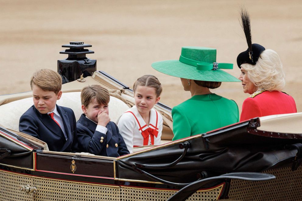 PHOTO: Prince George of Wales, Princess Charlotte of Wales and Prince Louis of Wales ride in a horse drawn carriage with Catherine, Princess of Wales and Queen Camilla during Trooping the Color, June 17, 2023 in London.