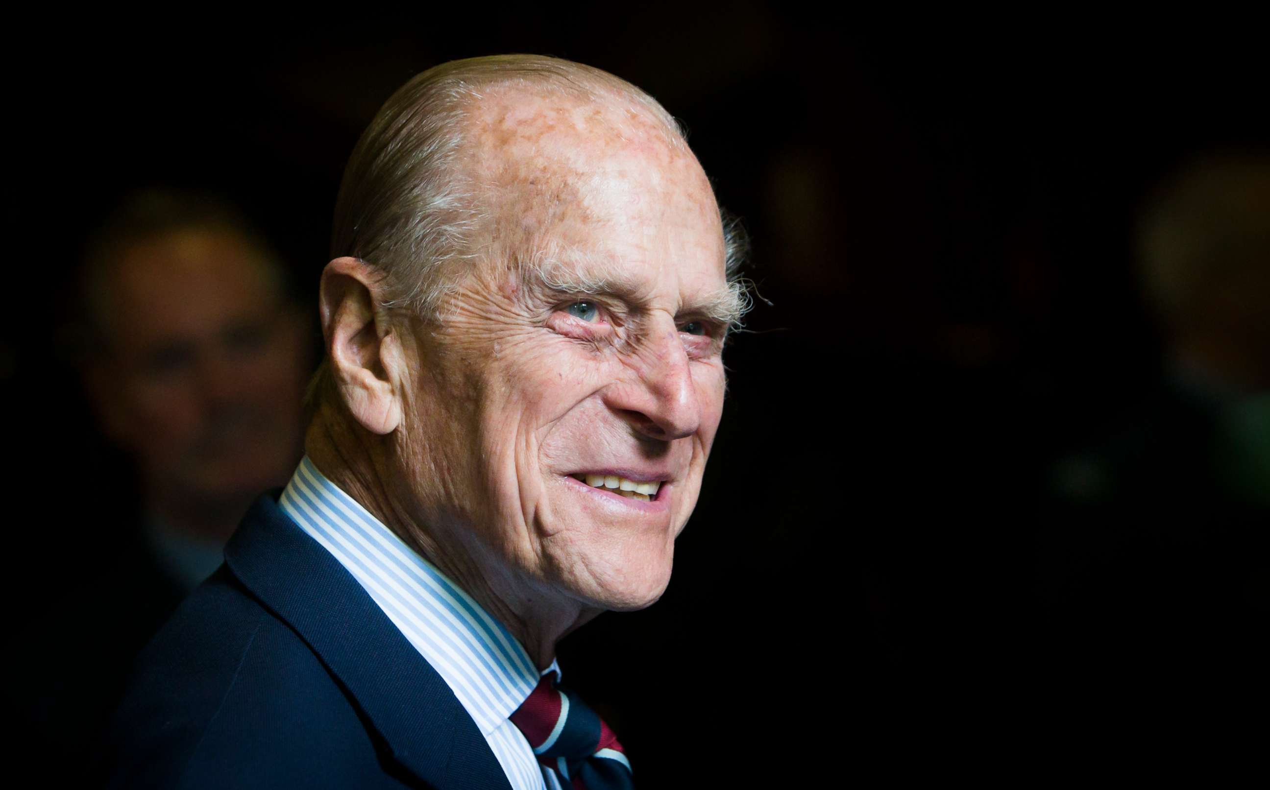 PHOTO: Prince Philip, Duke of Edinburgh smiles during a visit to the headquarters of the Royal Auxiliary Air Force's 603 Squadron on July 4, 2015, in Edinburgh, Scotland.