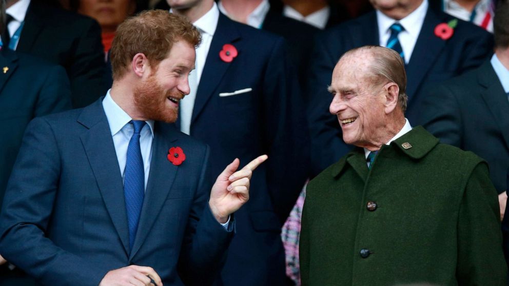 PHOTO: Prince Harry and Prince Philip during the 2015 Rugby World Cup Final at Twickenham Stadium on Oct. 31, 2015 in London.