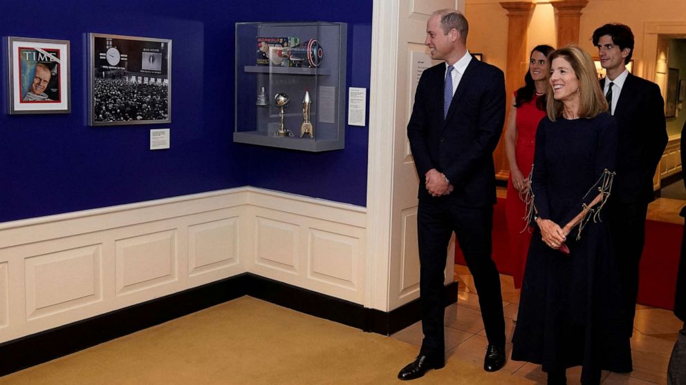 PHOTO: Britain's Prince William, Prince of Wales, and U.S. Ambassador to Australia Caroline Kennedy, daughter of late U.S. President Kennedy, tour a space exhibit the John F. Kennedy Presidential Library, in Boston, Dec. 2, 2022.