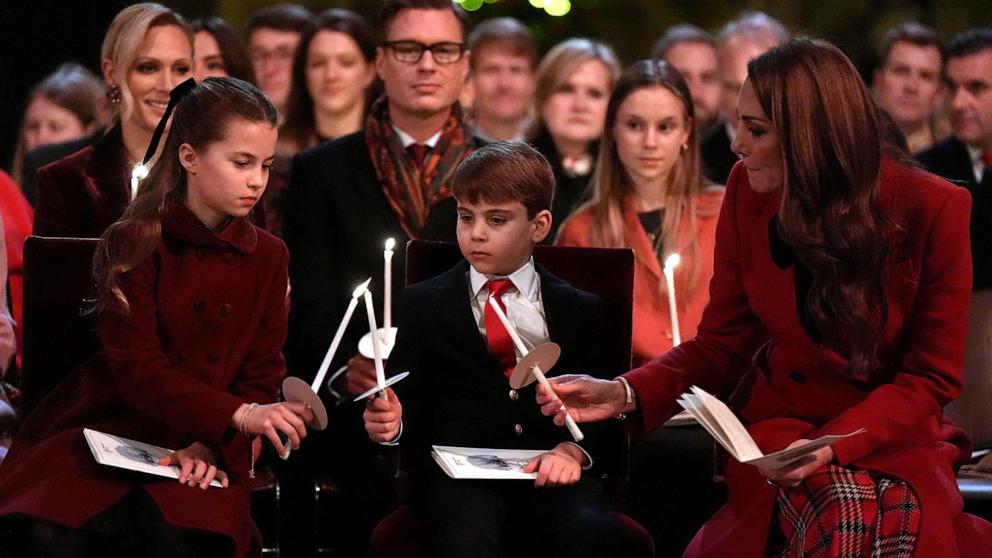 PHOTO: Britain's Princess Charlotte of Wales, Prince Louis of Wales and Catherine, Princess of Wales attend the "Together At Christmas Carol Service" at Westminster Abbey, Dec. 6, 2024, in London.