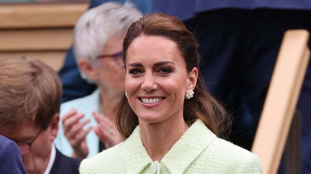 PHOTO: Catherine, Princess of Wales walks to her seat in the Royal Box for the Ladies Singles Final on day thirteen of the Wimbledon Tennis Championships in London, July 15, 2023.