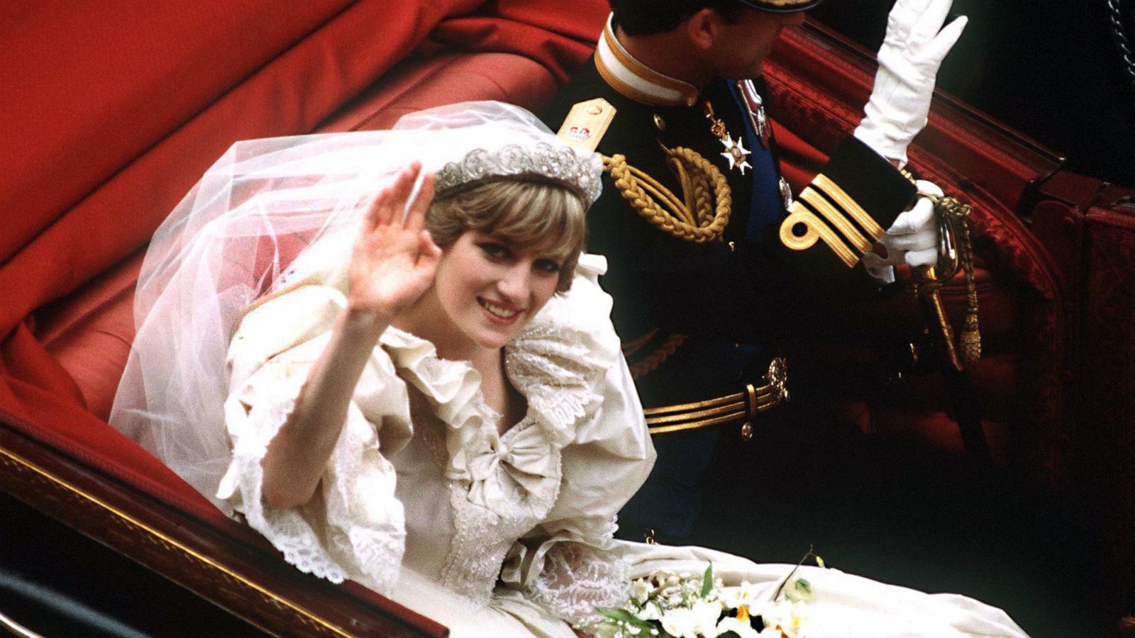 PHOTO: The Prince and Princess of Wales return to Buckingham Palace by carriage after their wedding in London, July 29, 1981.