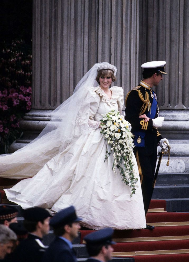 PHOTO: Prince Charles, Prince of Wales and Diana, Princess of Wales, wearing a wedding dress designed by David and Elizabeth Emanuel and the Spencer family Tiara, leave St. Paul's Cathedral following their wedding on July 29, 1981, in London.
