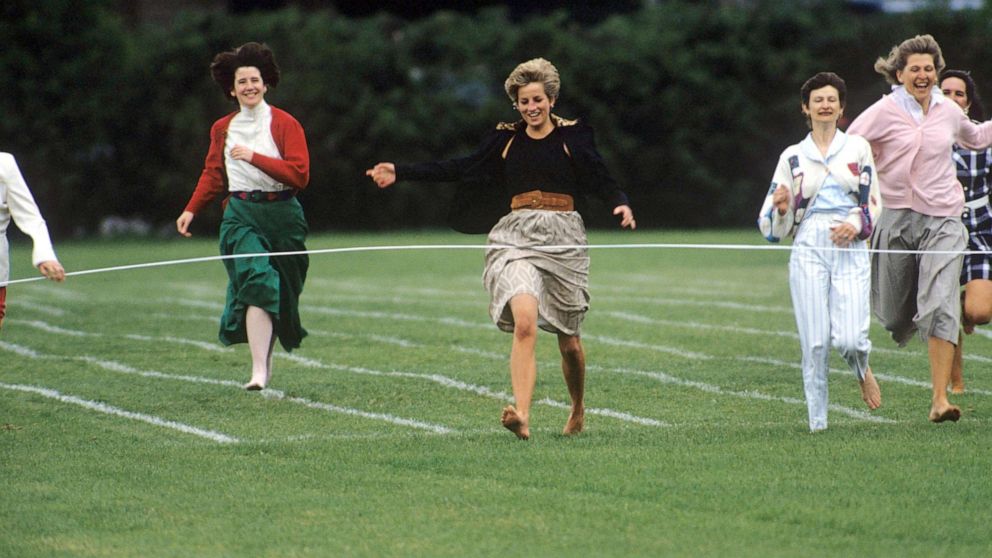 PHOTO: Princess Diana runs in the mother's race on Sport's Day at Prince Harry's school on June 11, 1991.