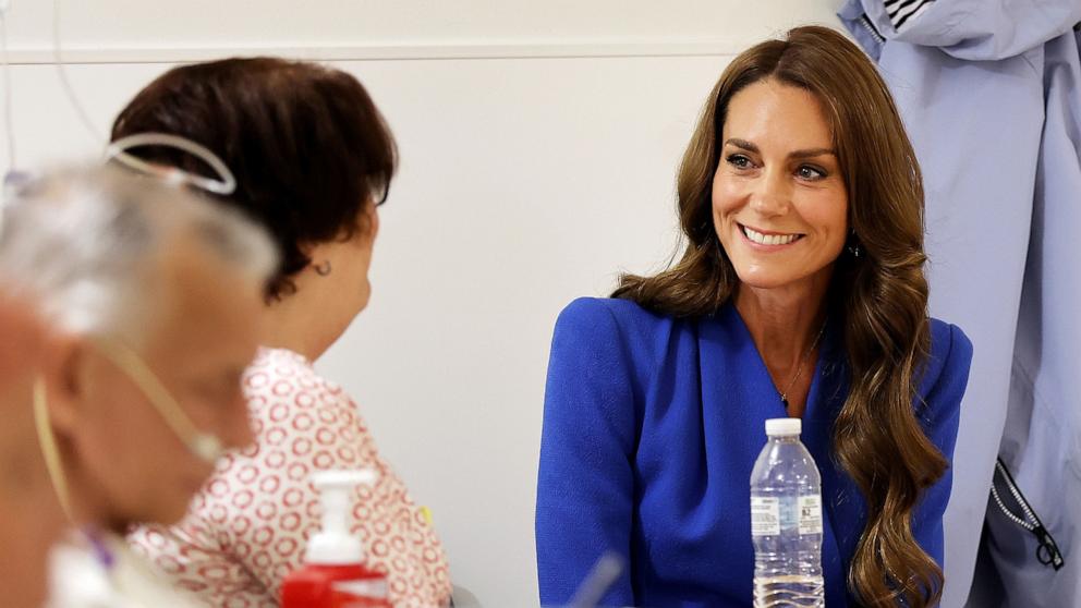 PHOTO: Britain's Kate, the Princess of Wales listens, during a visit to The Christie NHS Foundation Trust in Manchester, England, June 4, 2026.
