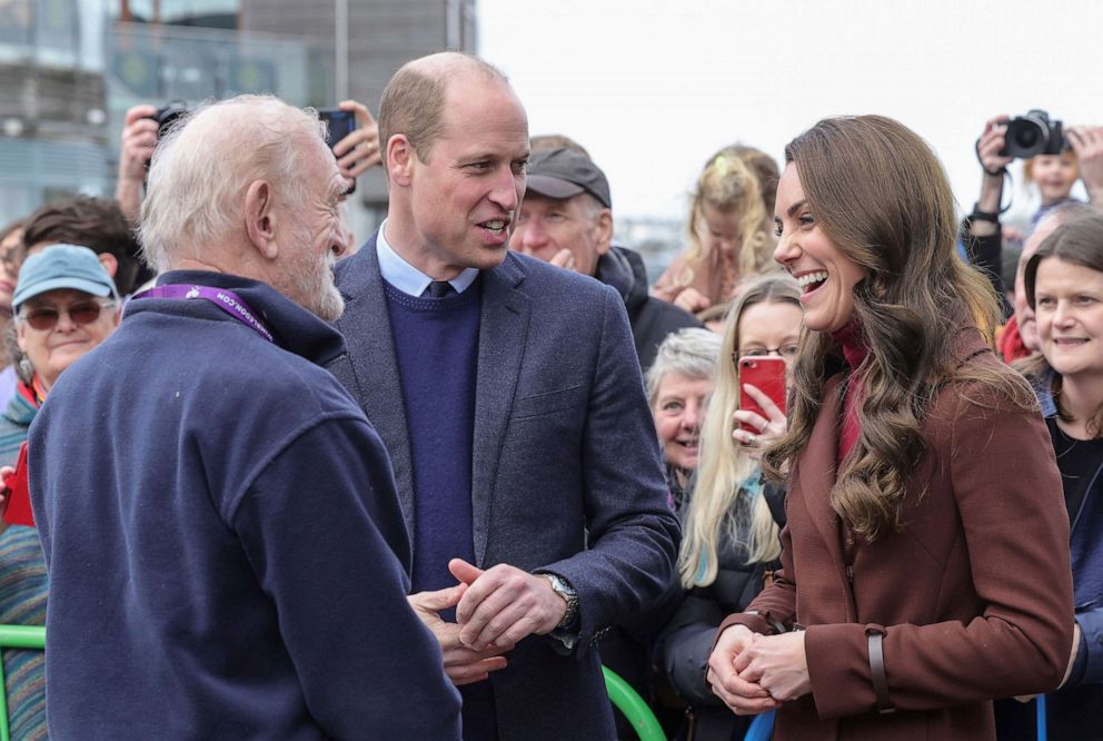 PHOTO: Prince William and Kate, Princess of Wales, known as the Duke and Duchess of Cornwall while in Cornwall meet a former school teacher of hers, Jim Embury, during a visit to the National Maritime Museum Cornwall in Falmouth, England, Feb. 9, 2023.