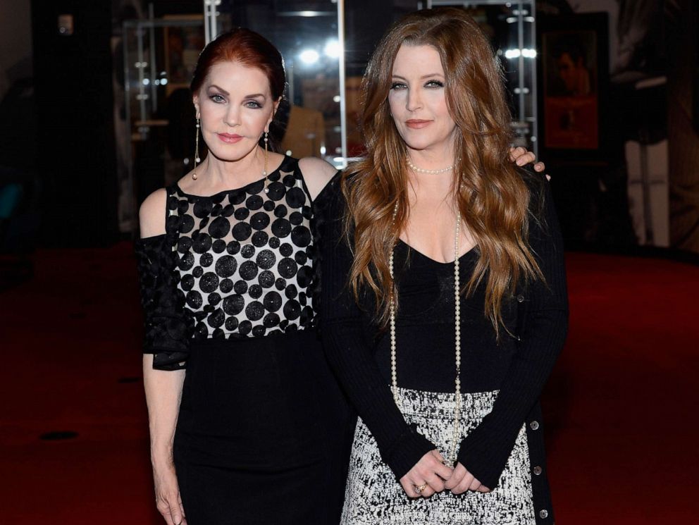 PHOTO: Priscilla Presley and her daughter Lisa Marie Presley attend the ribbon-cutting ceremony during the grand opening of Graceland Presents ELVIS: The Exhibition - The Show - The Experience, Apr. 23, 2015, in Las Vegas.