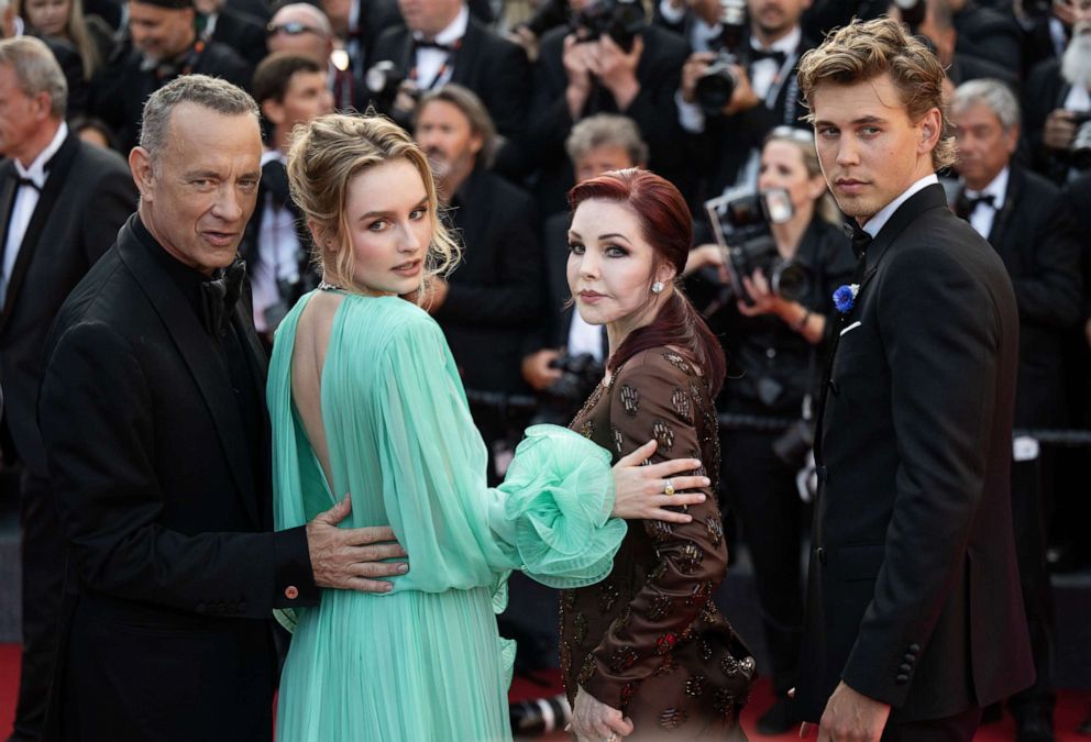 PHOTO: Tom Hanks, Olivia DeJonge, Priscilla Presley and Austin Butler attend the screening of "Elvis" during the 75th annual Cannes Film Festival at Palais des Festivals, on May 25, 2022, in Cannes, France.