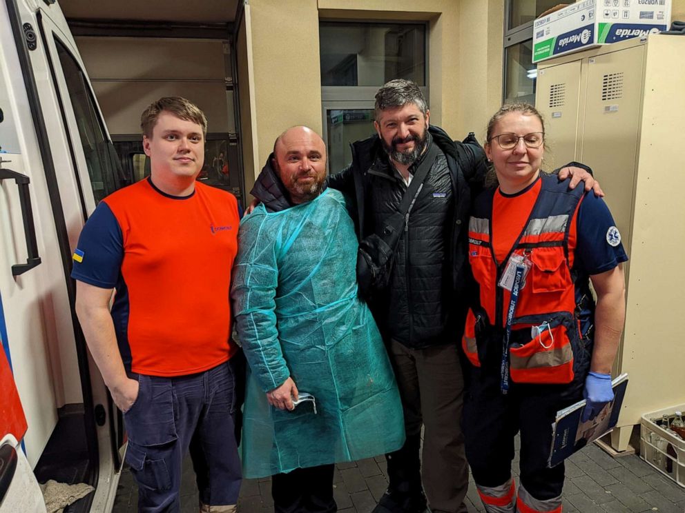PHOTO: Alex Spektor, second from left, and Project Dynamo's Bryan Stern, second from right, pose with rescue paramedics in Poland.