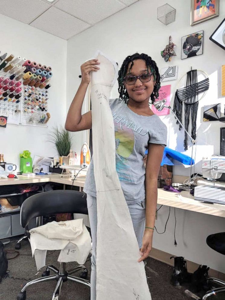 PHOTO: Courtney Lewis, 14, created a floor-length sequin gown for her sister Mikayla Lewis, 18, which included a train and back jewelry embellishments.