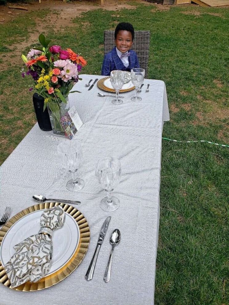 PHOTO: Rachel Chapman was surprised with dinner and a dance all thanks to 7-year-old Curtis Rogers. With help from his mother, Curtis put the event together in his own backyard. Rachel is a senior at Sanderson High School in Raleigh, North Carolina.