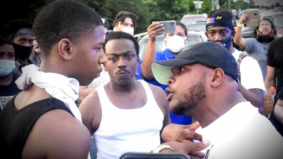 PHOTO: On May 30, activist Curtis Hayes, 31, was seen having a passionate discussion with a 45-year-old man and a 16-year-old boy during a demonstration in Charlotte.