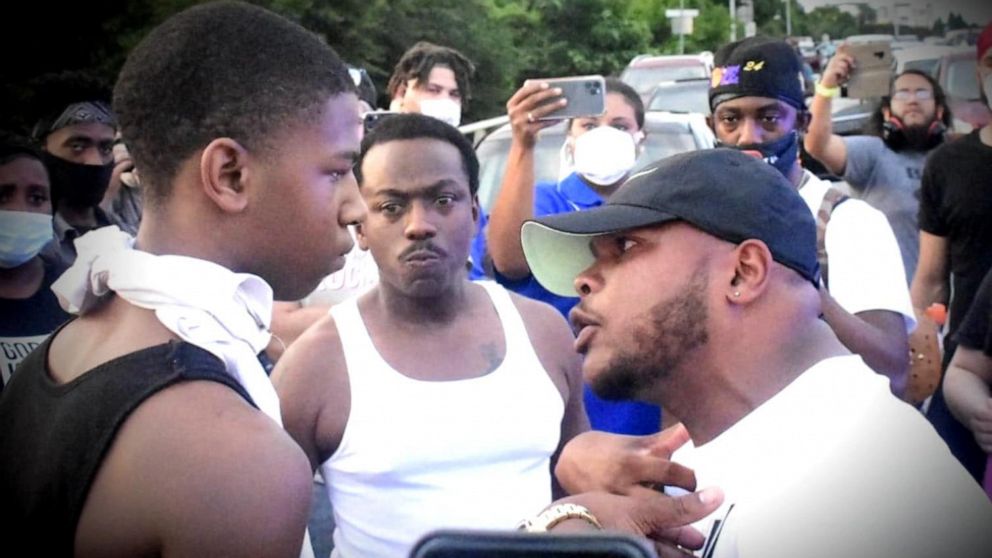 PHOTO: On May 30, activist Curtis Hayes, 31, was seen having a passionate discussion with a 45-year-old man and a 16-year-old boy during a demonstration in Charlotte.