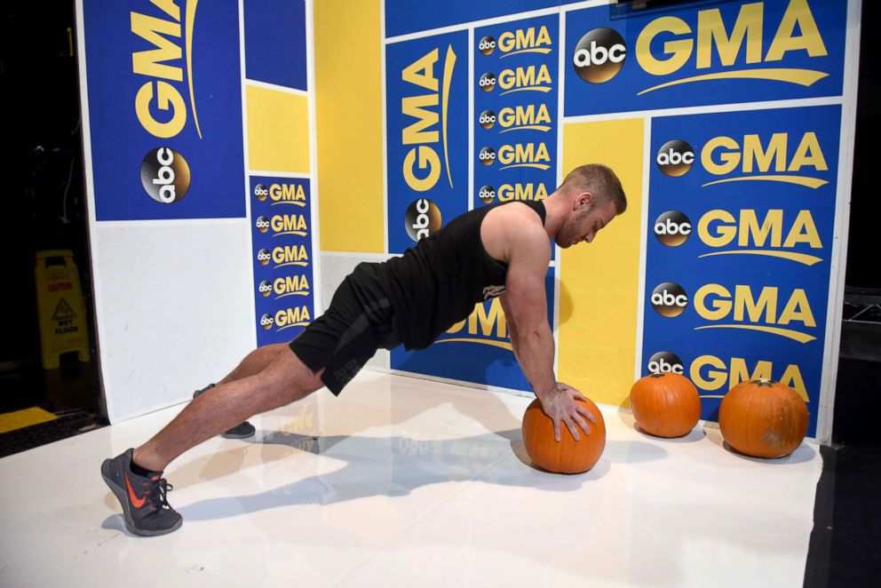 PHOTO: Barry's Bootcamp trainer Josey Greenwell demonstrates the pumpkin push-up.