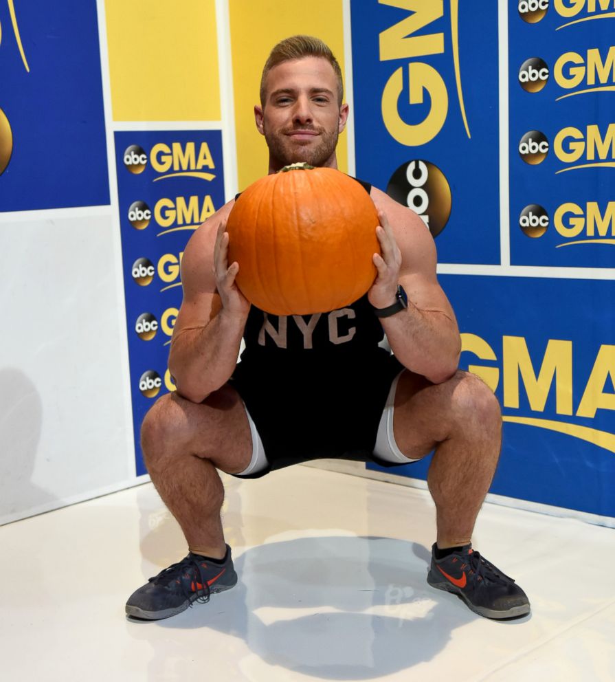 PHOTO: Barry's Bootcamp trainer Josey Greenwell demonstrates the squash squat.